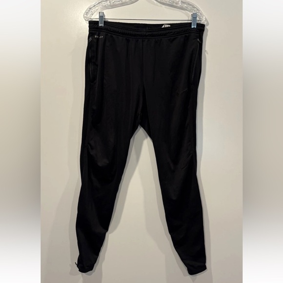 Nike Dri Fit Mens Black Running Jogger Pants Zip Ankle Pockets Size Medium - Picture 1 of 6